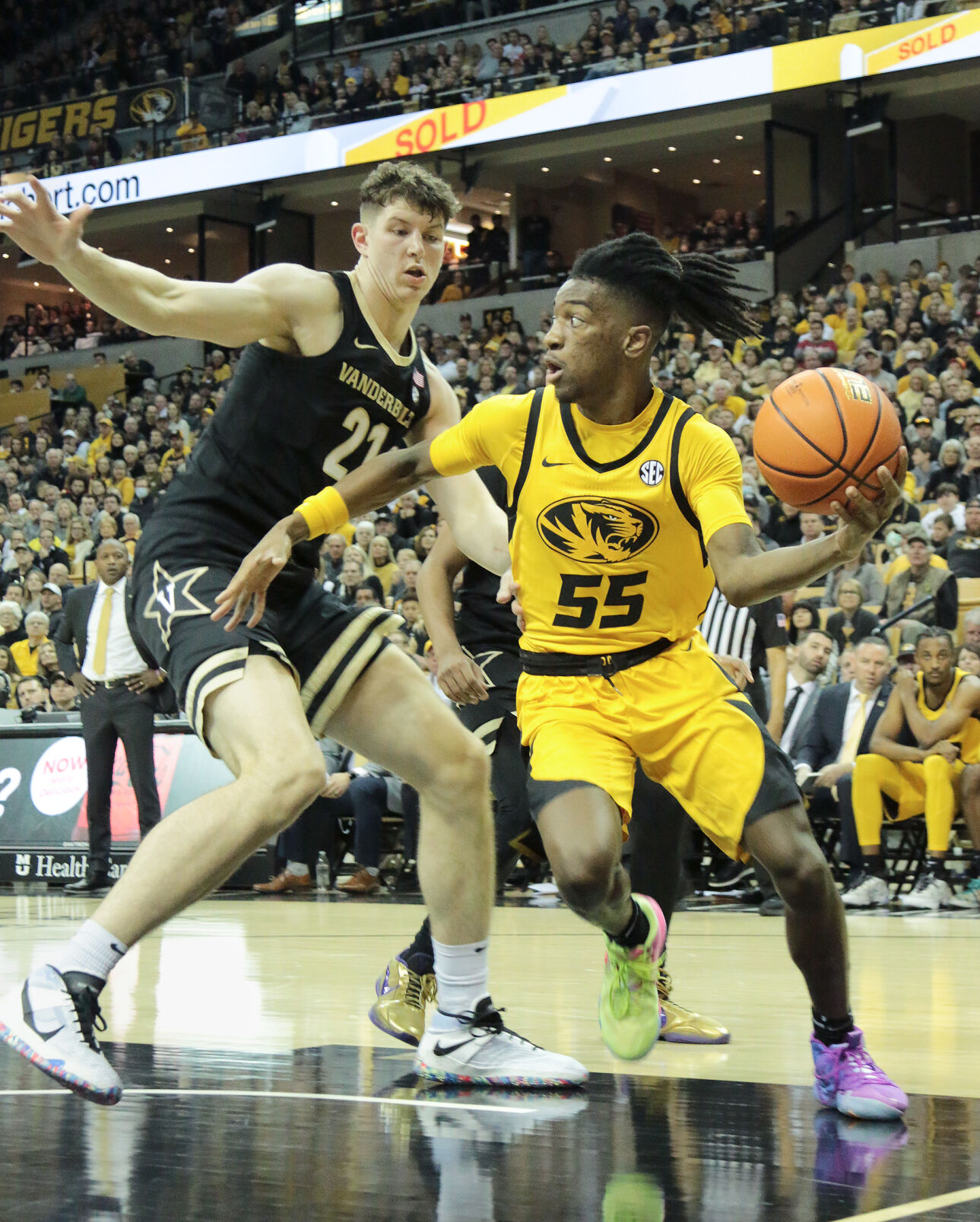 Sean East II prepares to pass the ball past Vanderbilt’s